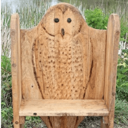 Owl themed carving bench seating by the wild deck company Owl themed carving bench seating by the wild deck company